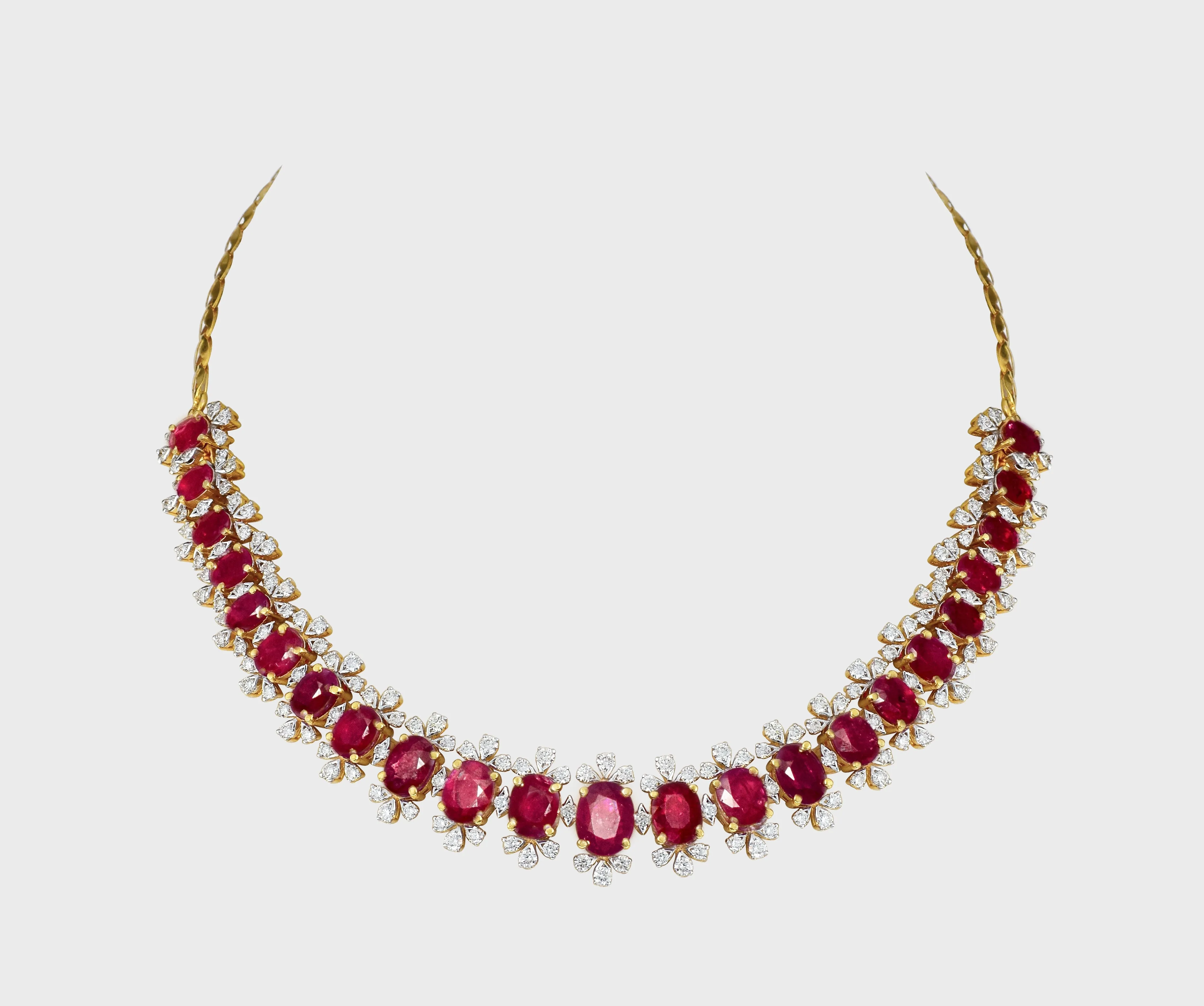 Embrace luxury and allure with our Ruby oval and diamond Necklace cum Bracelet set. Radiating elegance and sophistication, this exquisite ensemble effortlessly blends classic charm with modern glamour.(PGDNE0126)