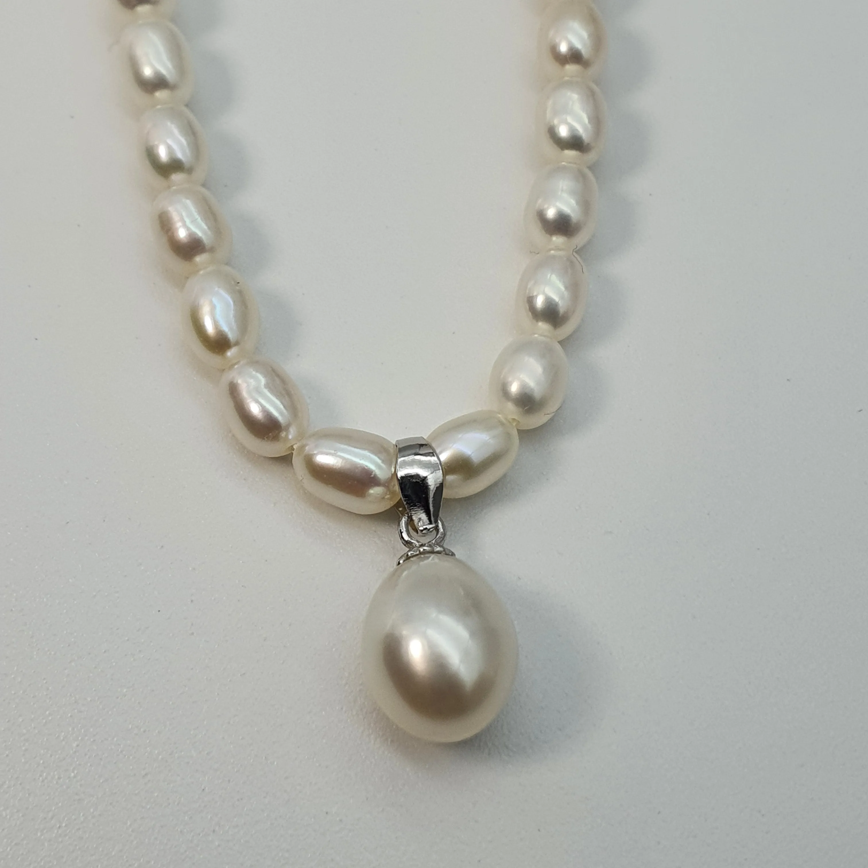 Feshwater Cultured Pearl Strand With Pendant , Sterling Silver Fower Clasp