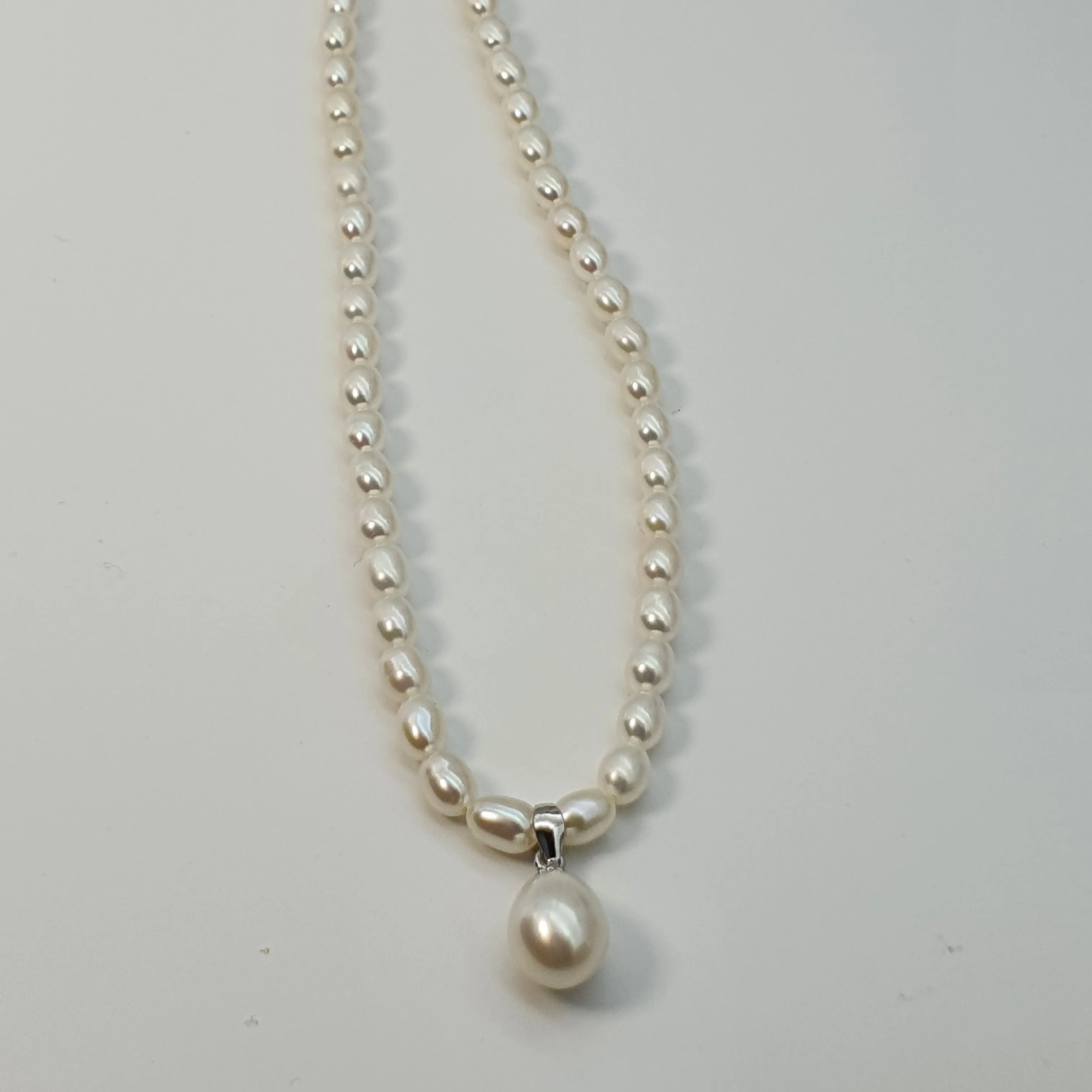Feshwater Cultured Pearl Strand With Pendant , Sterling Silver Fower Clasp