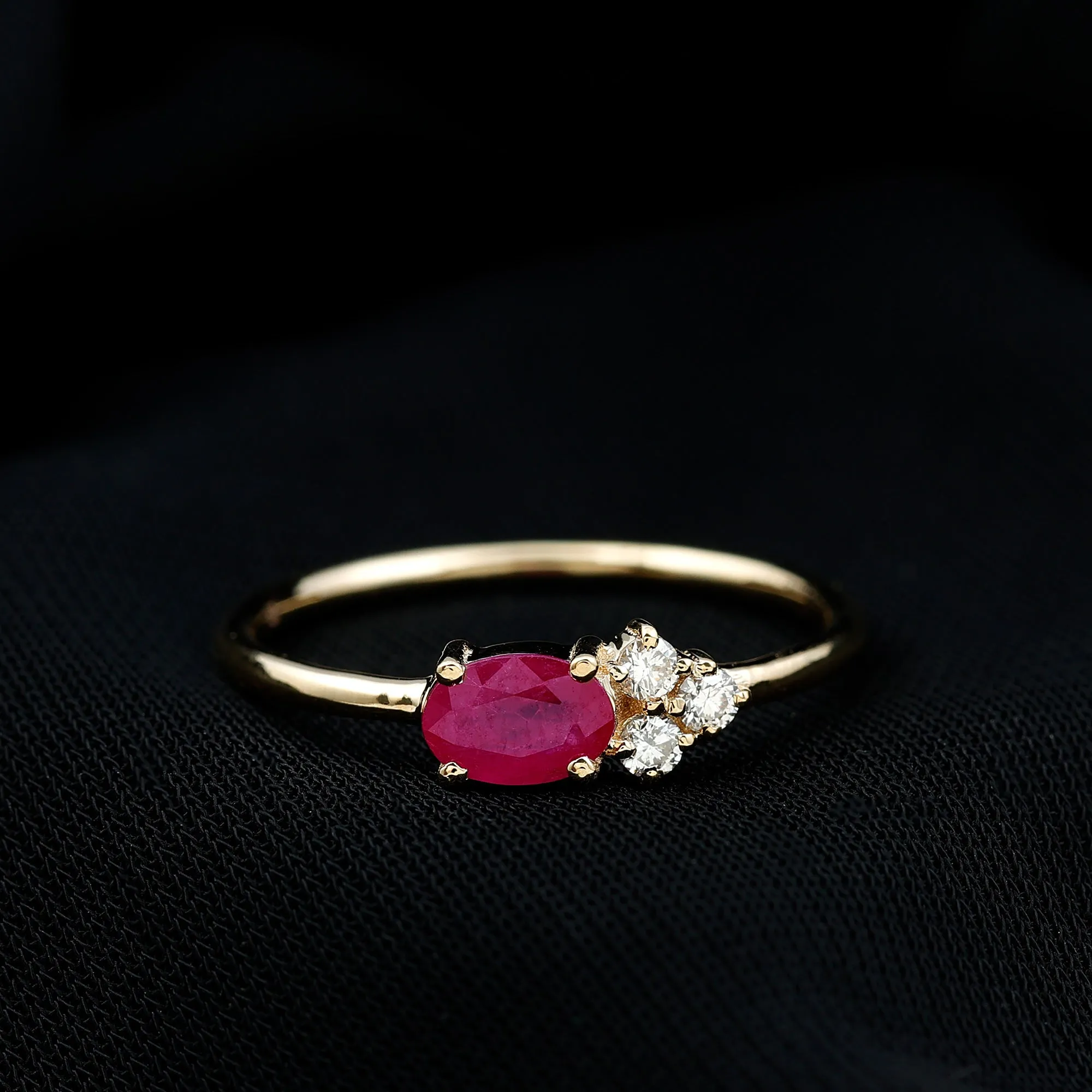 Oval Cut Ruby Promise Ring with Diamond Trio