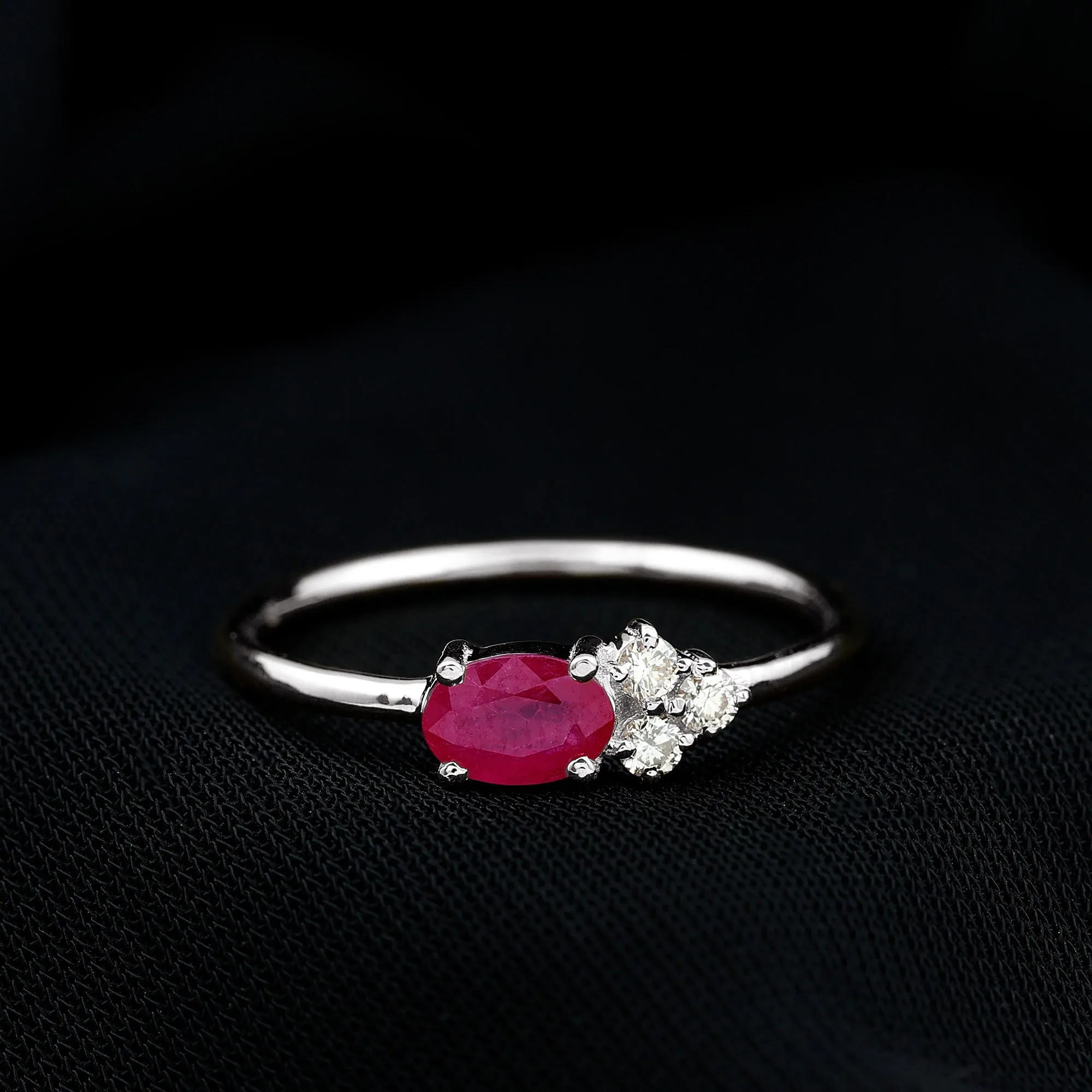 Oval Cut Ruby Promise Ring with Diamond Trio