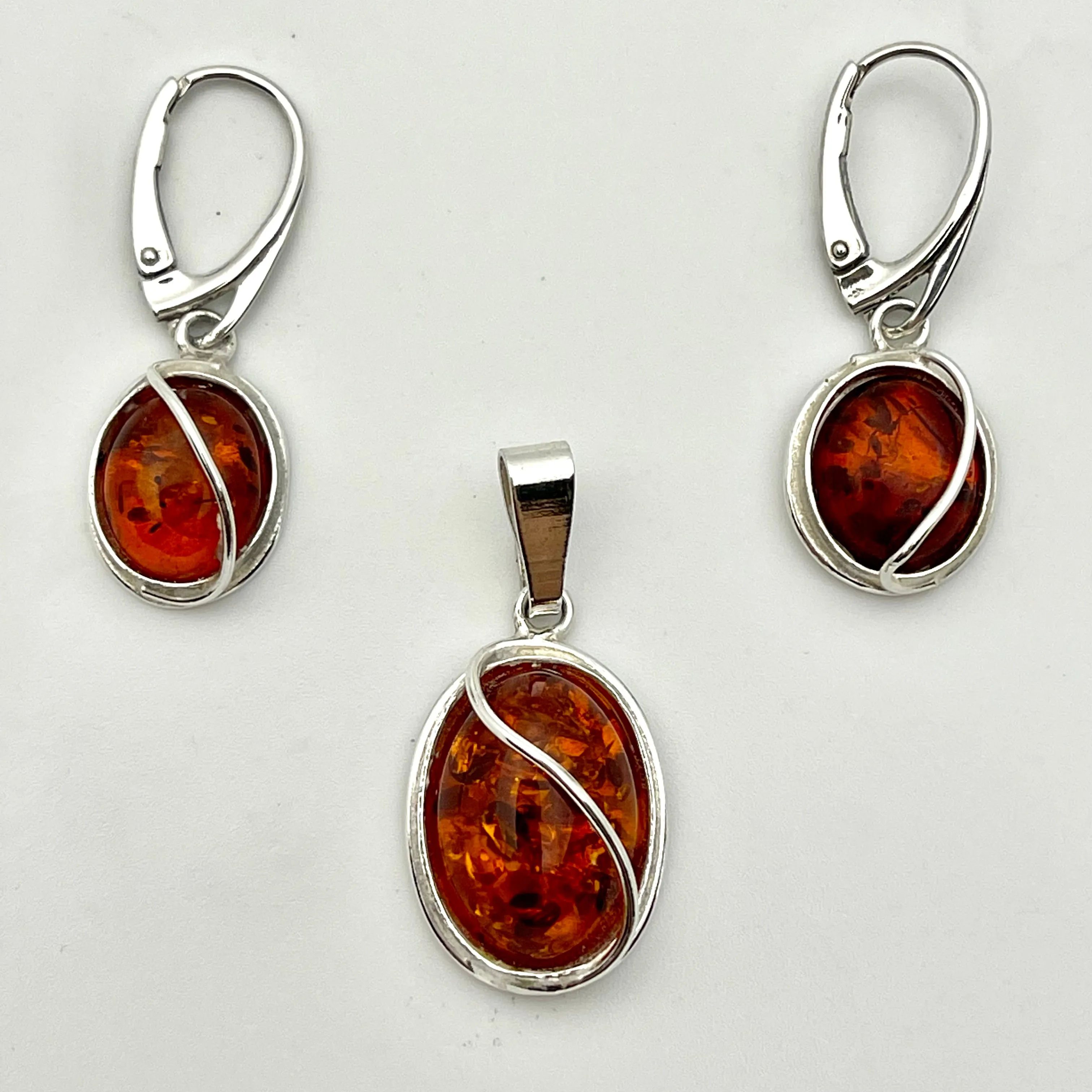 Sterling Silver Amber Ovals With Wire Earrings and Pendant